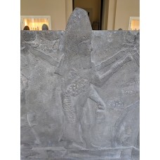 Reconstruction of Ashur water basin, man in fish clothes